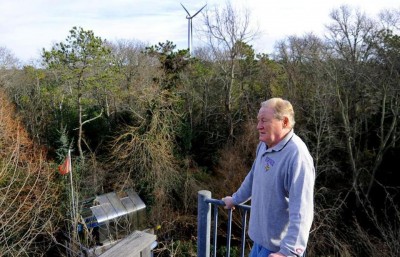 “The first time I heard it, I couldn’t believe it could make that much noise,” he says of the turbines. Debee Tlumacki for The Boston Globe 