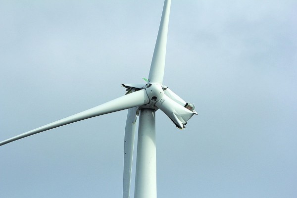 This wind turbine blade in Sigel Township, broken and wrapped around the structure, is under investigation by DTE Energy officials. Seth Stapleton/Huron Daily Tribune